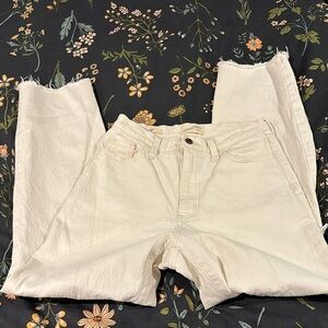 White/cream wide legged ripped jeans! Size:S